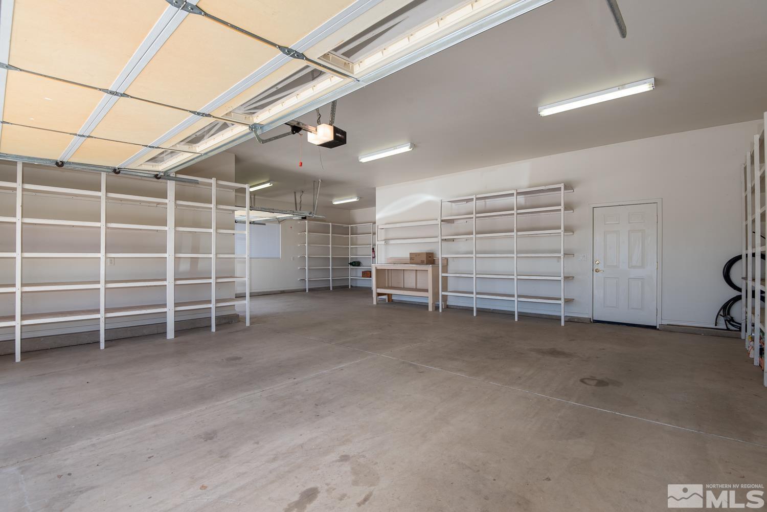 2876 Jackie Circle Minden, NV 89423 - Photo 24 of 40 a view of a room with storage and racks