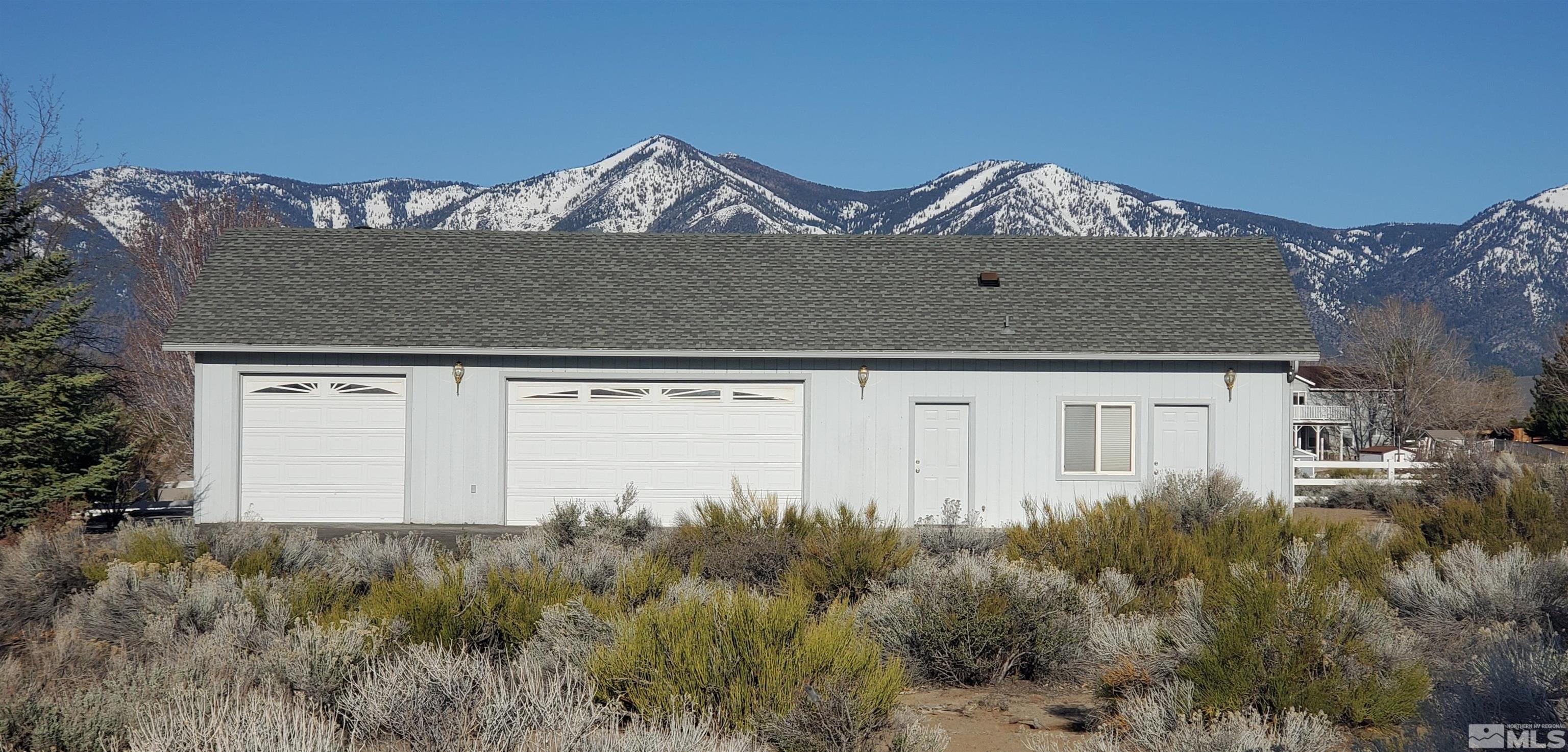 2876 Jackie Circle Minden, NV 89423 - Photo 25 of 40 a view of a house with a yard