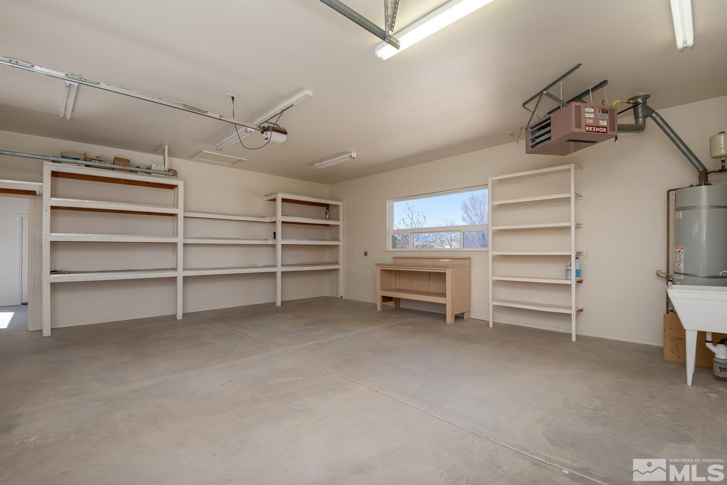2876 Jackie Circle Minden, NV 89423 - Photo 27 of 40 a view of walk in closet with empty racks