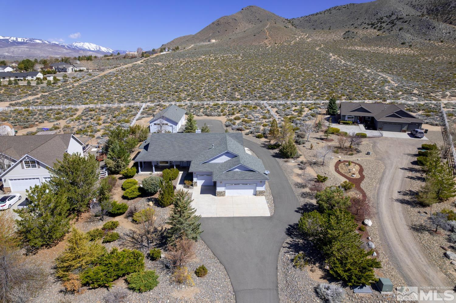 2876 Jackie Circle Minden, NV 89423 - Photo 4 of 40 an aerial view of residential houses with outdoor space