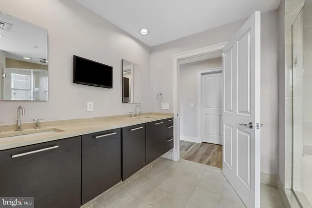 a bathroom with a shower and a bathtub