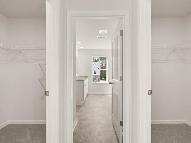 a view of a livingroom from a hallway