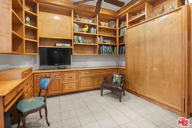 a view of a workspace with furniture