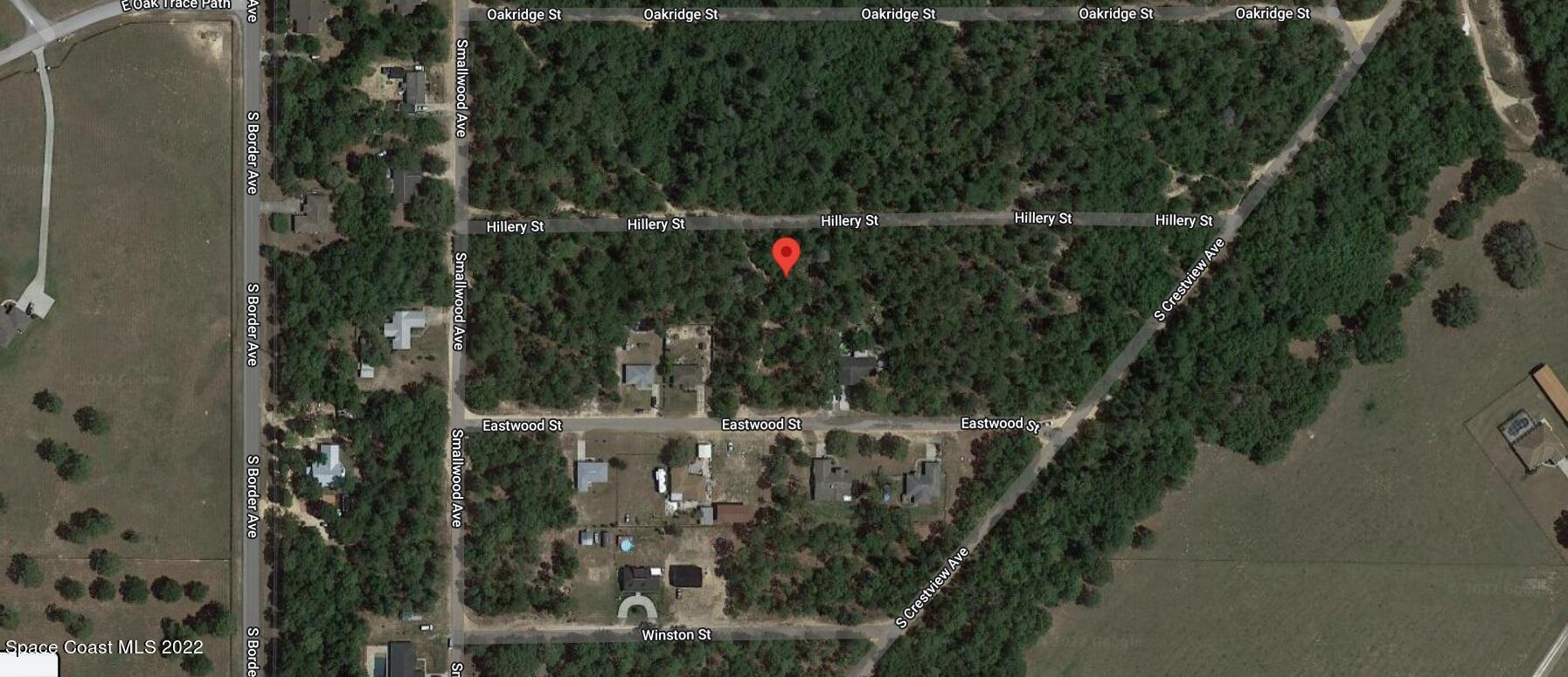 2807 Hillery Street Inverness, FL 34452 - Photo 5 of 5 a view of a wooden fence