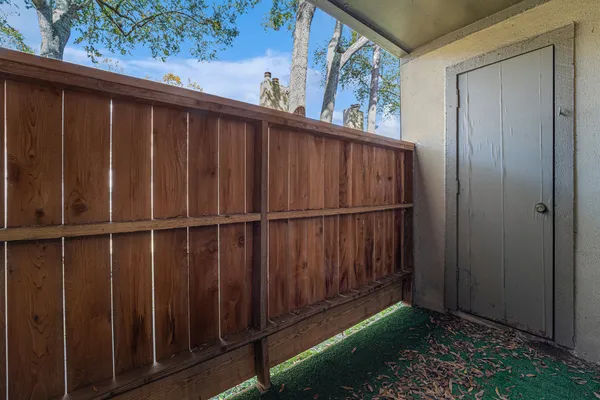 a view of a backyard of the house