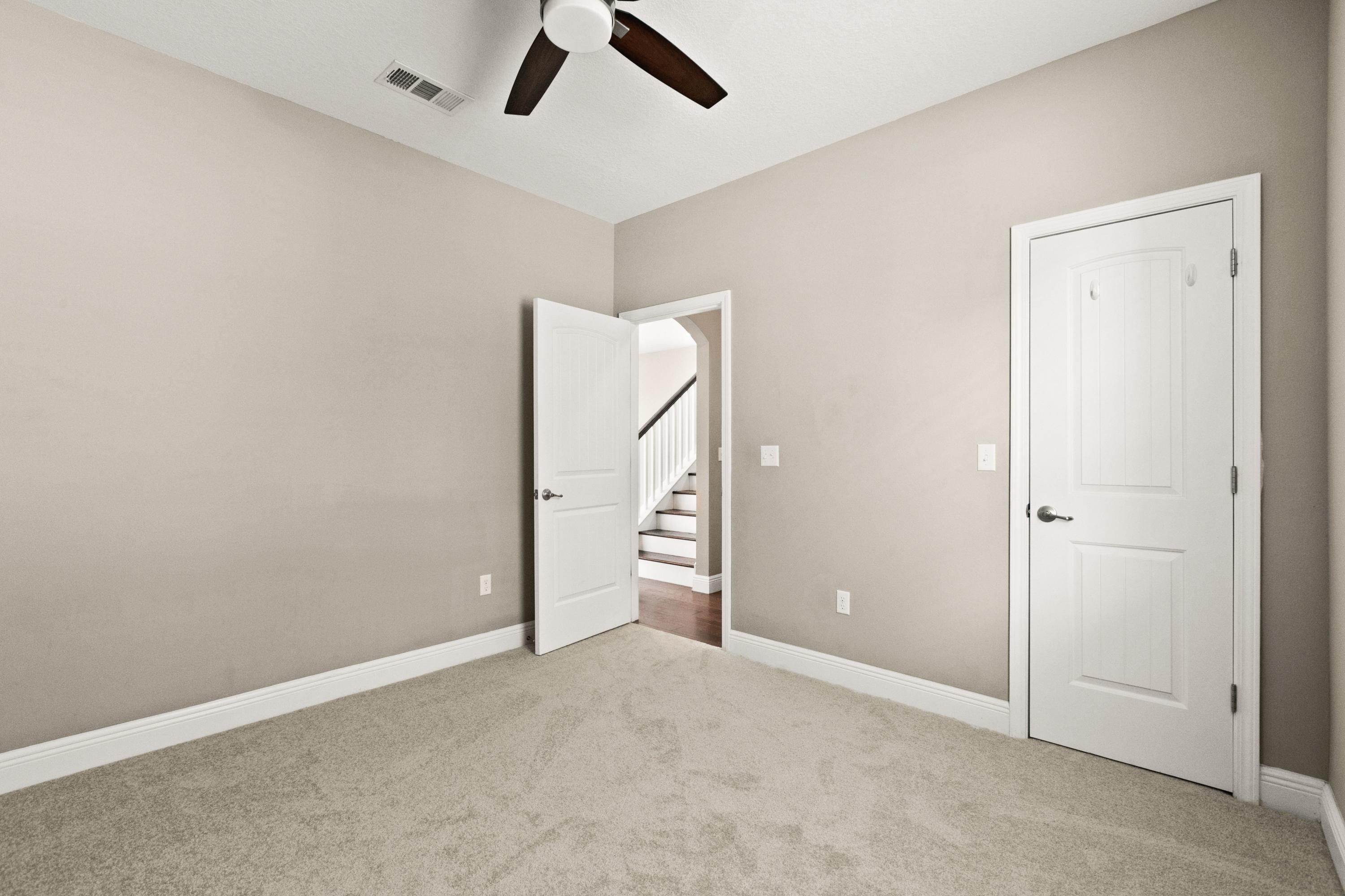 27 Inlet Cove Inlet Beach, FL 32461 - Photo 13 of 31 an empty room with closet and windows