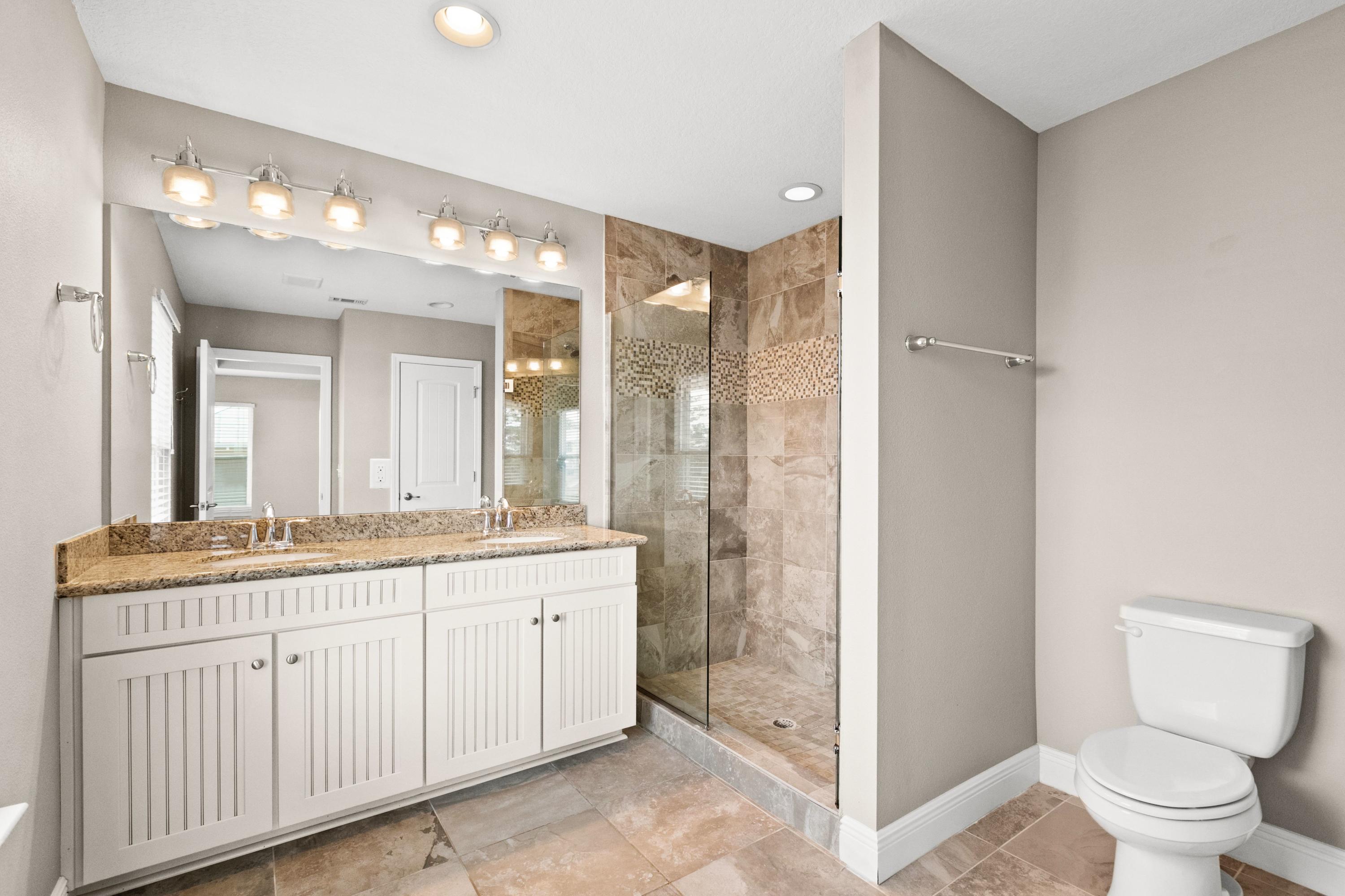 27 Inlet Cove Inlet Beach, FL 32461 - Photo 20 of 31 a bathroom with a double vanity sink mirror and toilet