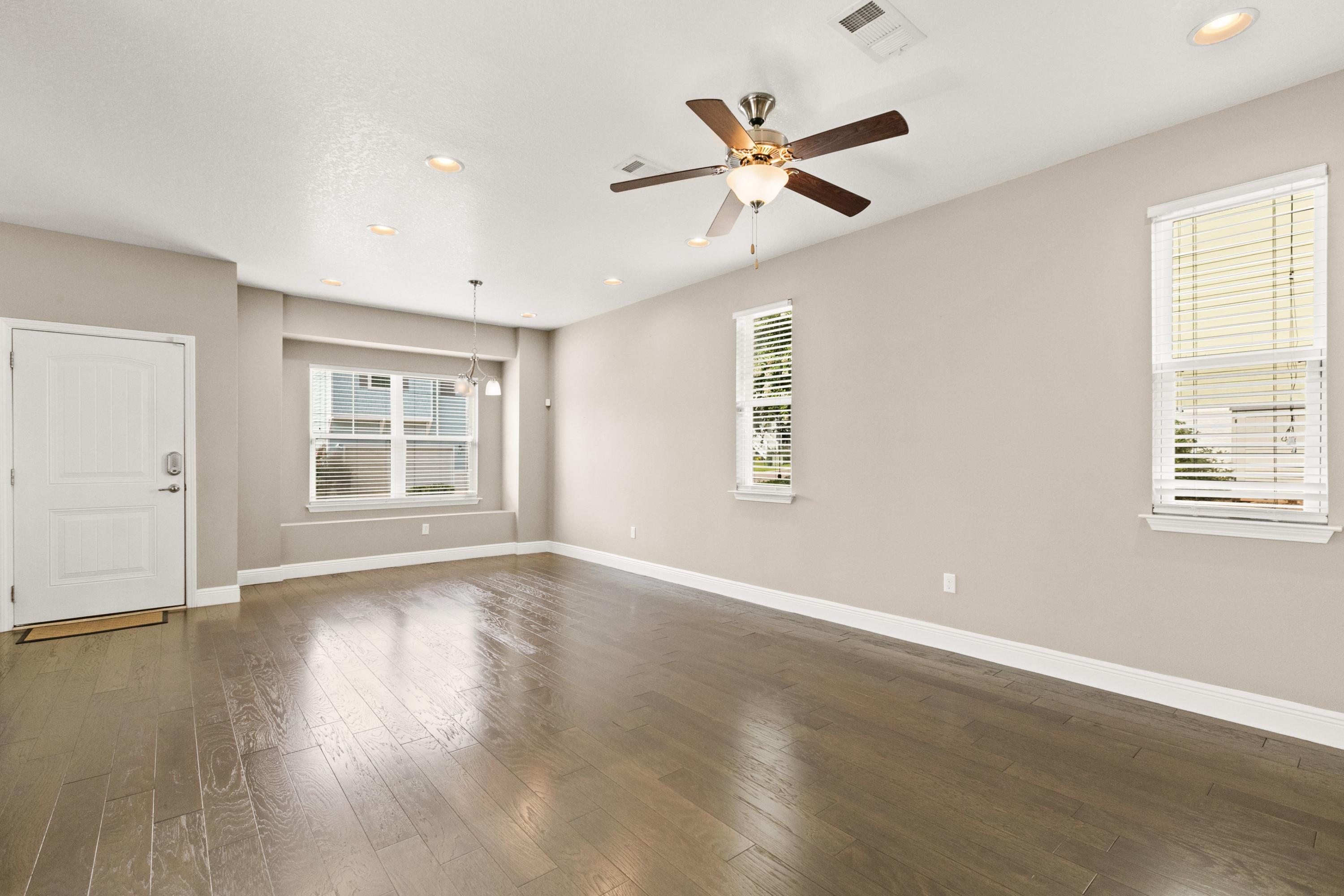 27 Inlet Cove Inlet Beach, FL 32461 - Photo 8 of 31 a view of an empty room with wooden floor and a window