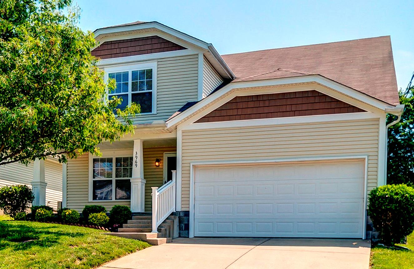 3969 Stephens Ridge Way Antioch, TN 37013 - Photo 1 of 29 a front view of a house with a yard