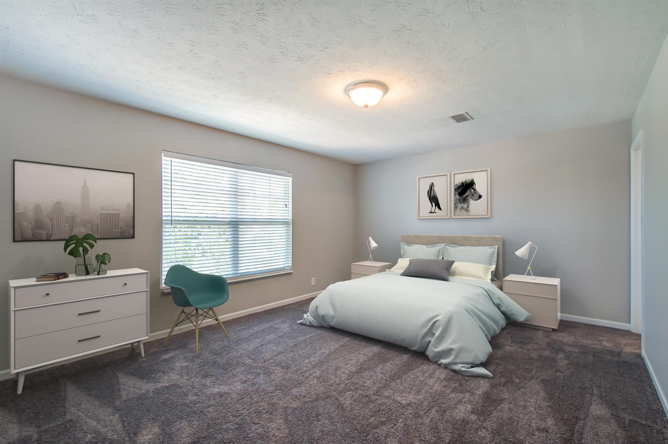 3969 Stephens Ridge Way Antioch, TN 37013 - Photo 16 of 29 a bedroom with a large bed and a window