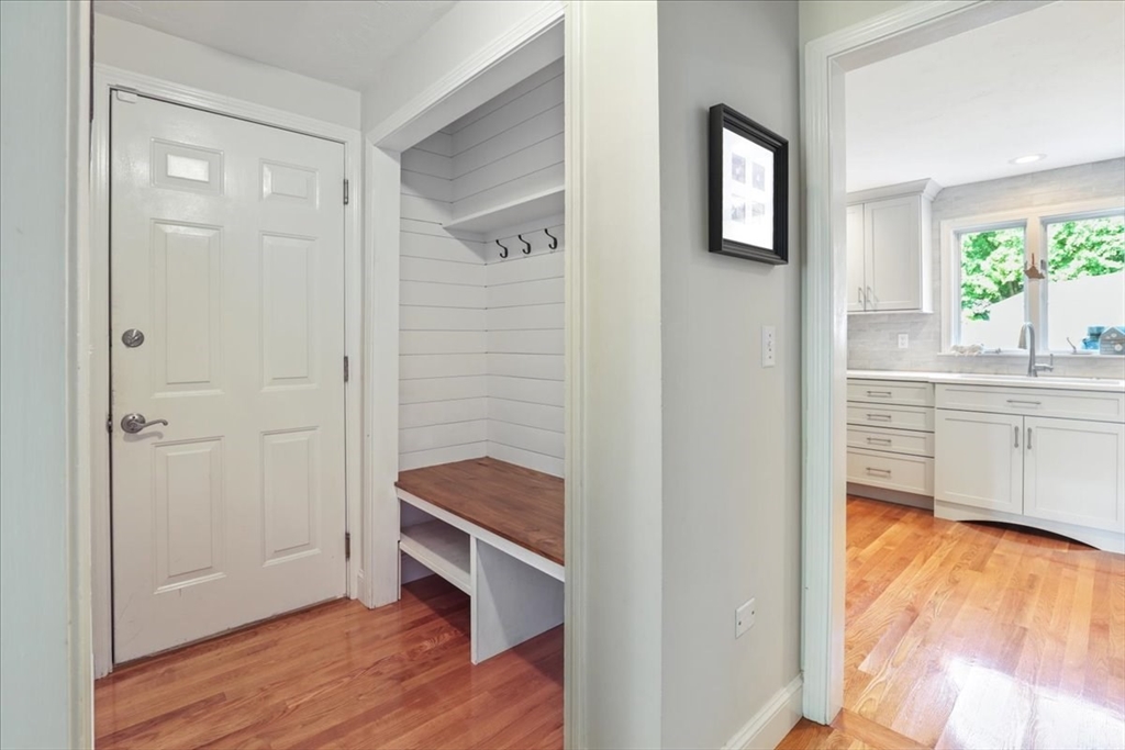 22 Constitution Way Hanson, MA 02341 - Photo 18 of 40 a bathroom with a sink and a mirror