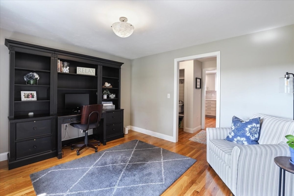 22 Constitution Way Hanson, MA 02341 - Photo 19 of 40 a bedroom with furniture and a rug