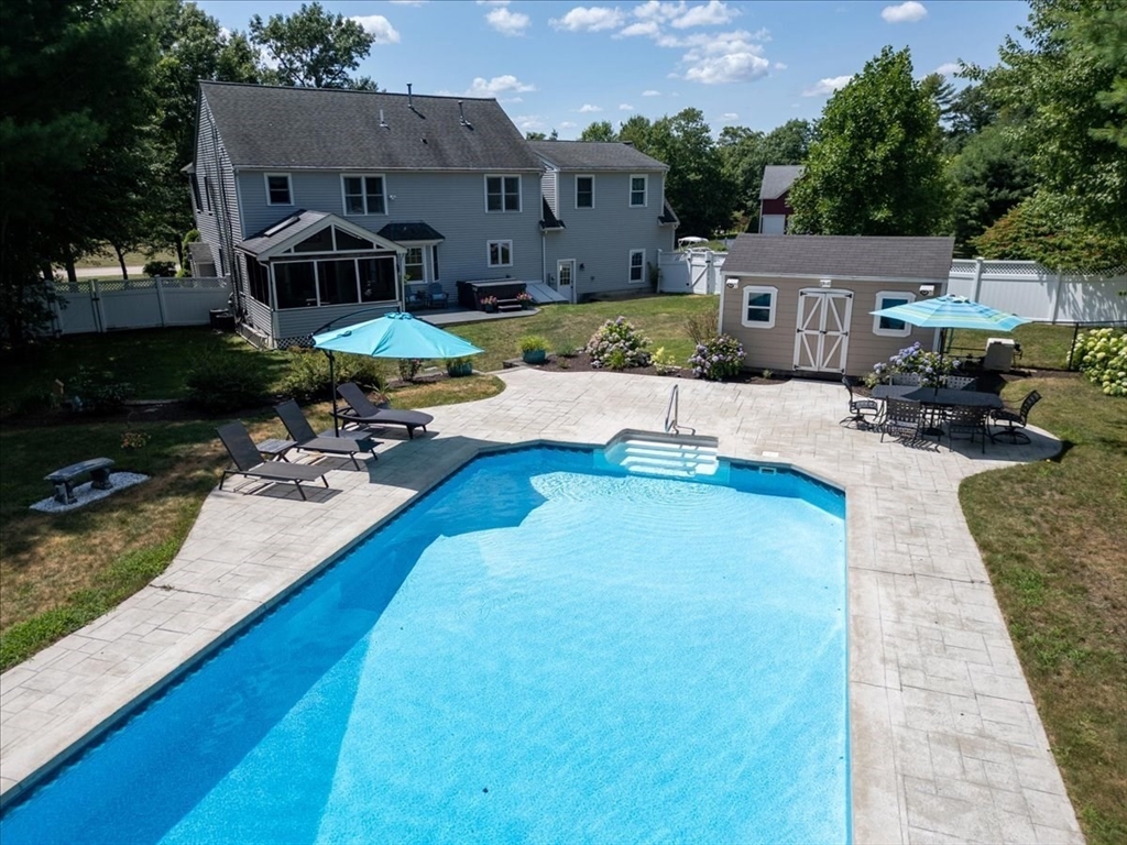 22 Constitution Way Hanson, MA 02341 - Photo 7 of 40 a view of a house with swimming pool and sitting area