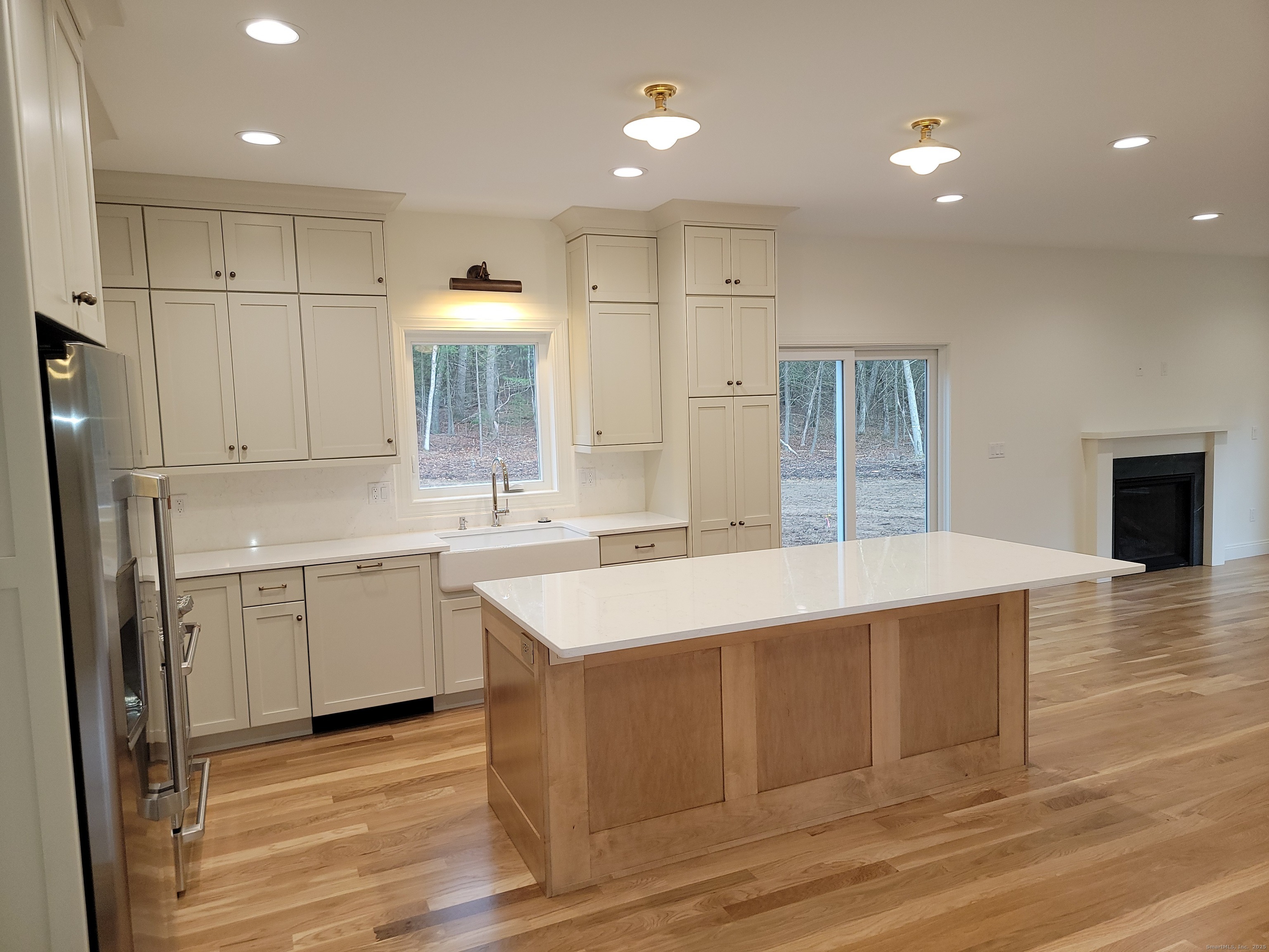 963 High Road Berlin, CT 06037 - Photo 11 of 39 a kitchen with a sink cabinets and wooden floor