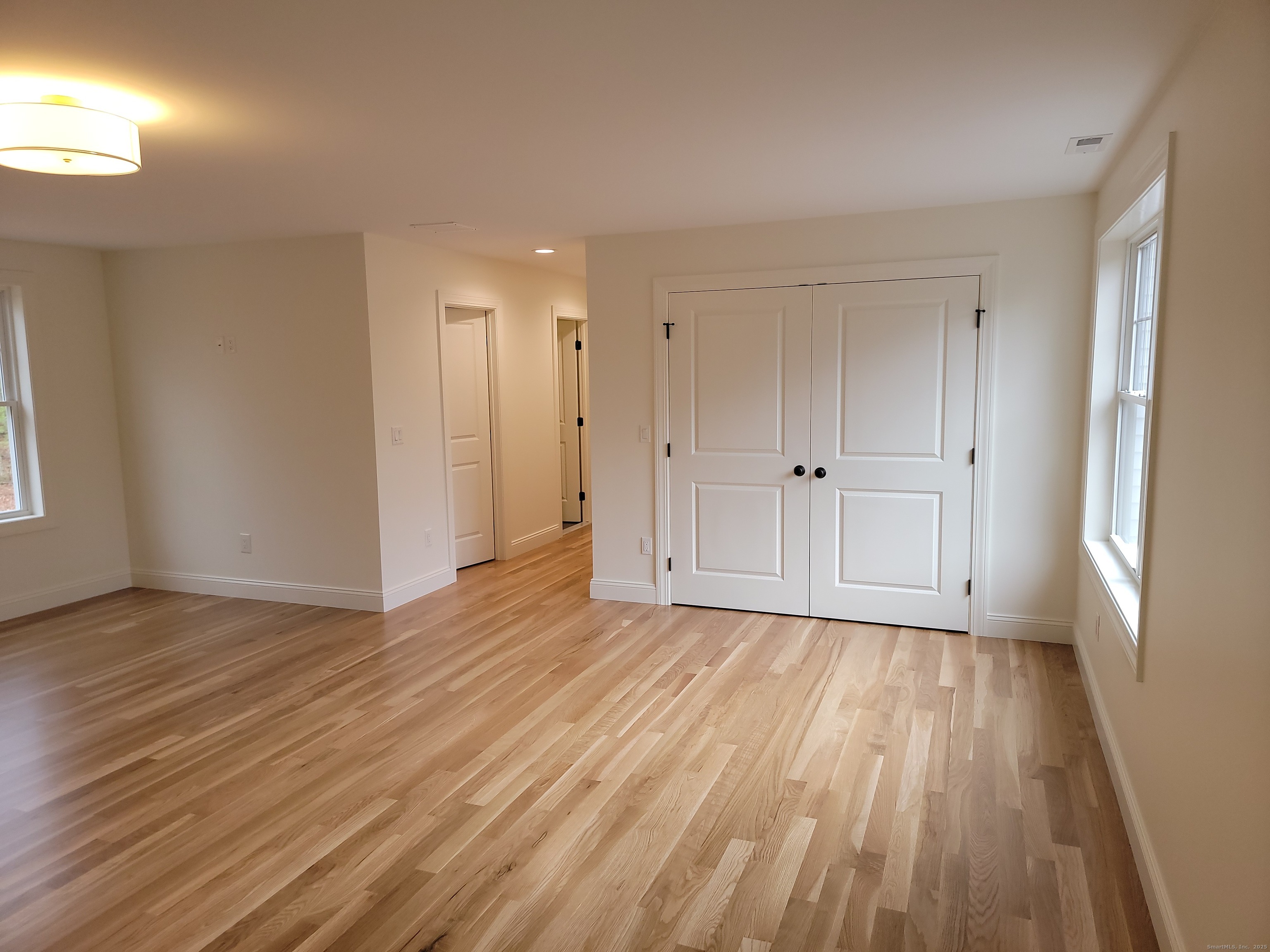 963 High Road Berlin, CT 06037 - Photo 19 of 39 a view of an empty room and wooden floor