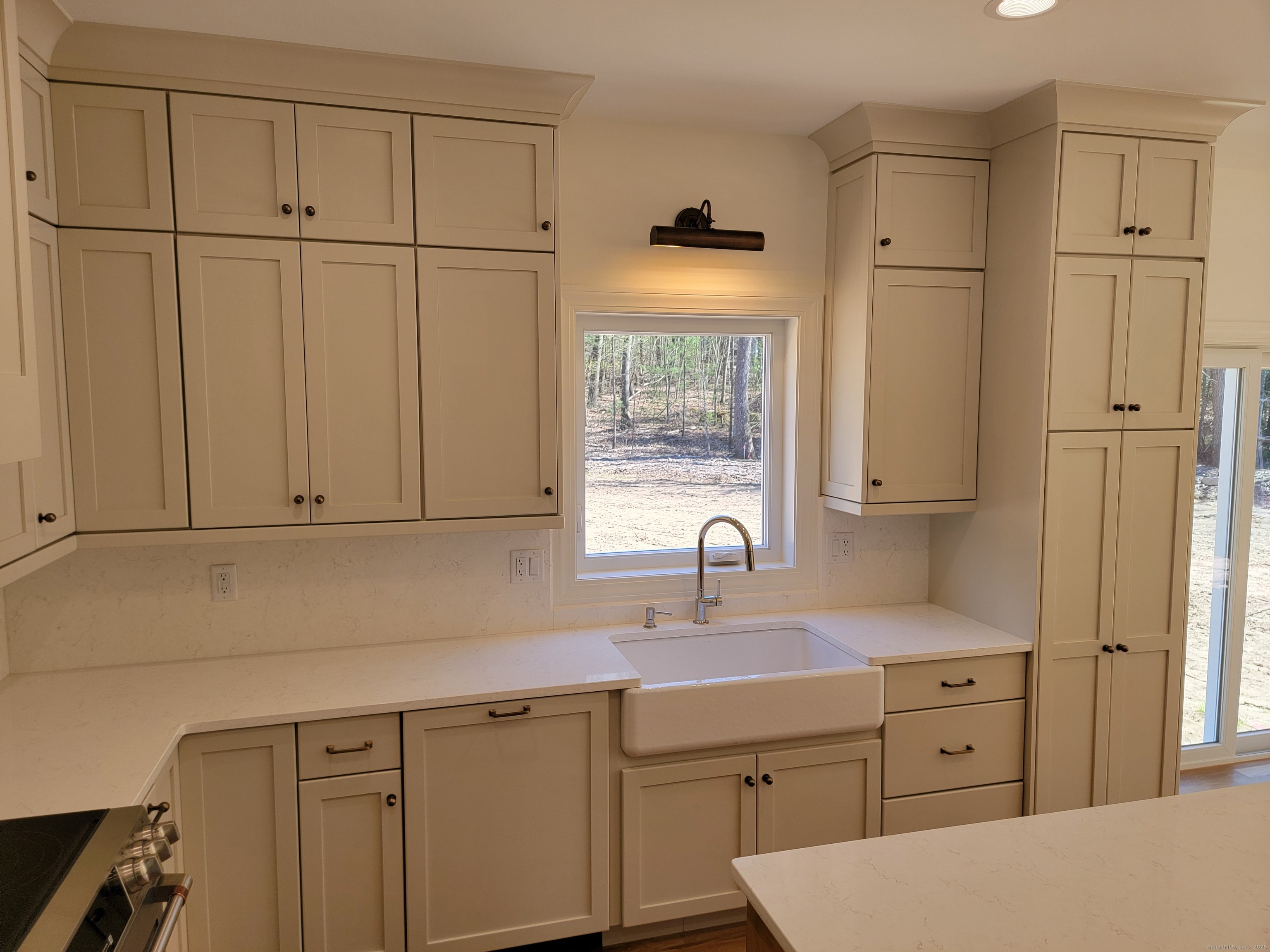 963 High Road Berlin, CT 06037 - Photo 21 of 39 a kitchen with stainless steel appliances granite countertop a refrigerator sink and cabinets