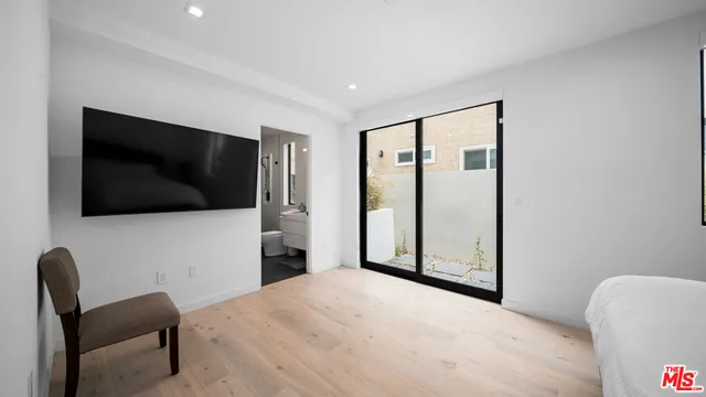 a view of a livingroom with a flat screen tv