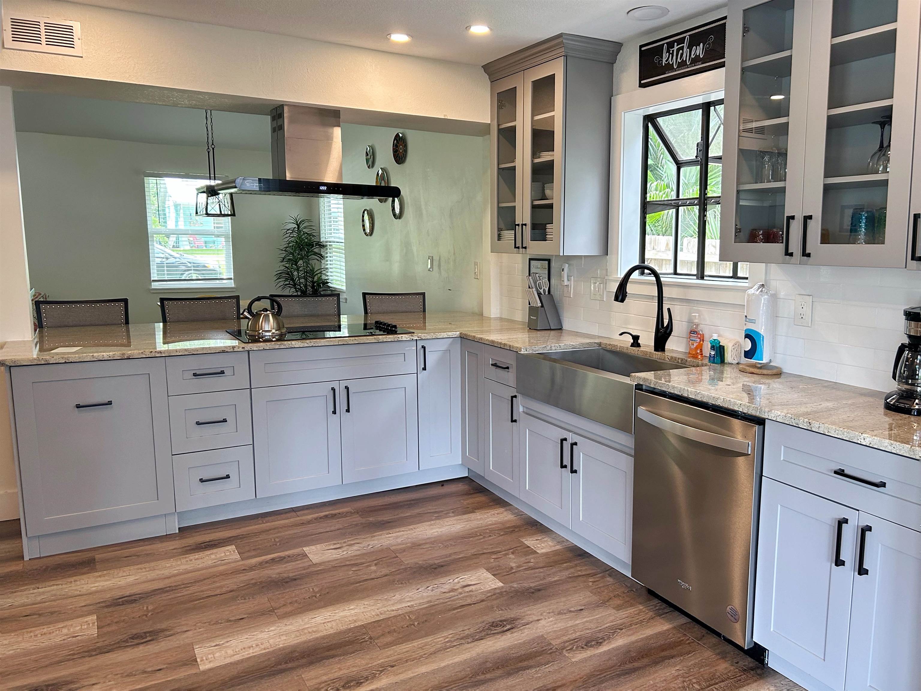 155 Drake Road St. Augustine, FL 32086 - Photo 11 of 32 a kitchen with a sink stove and cabinets