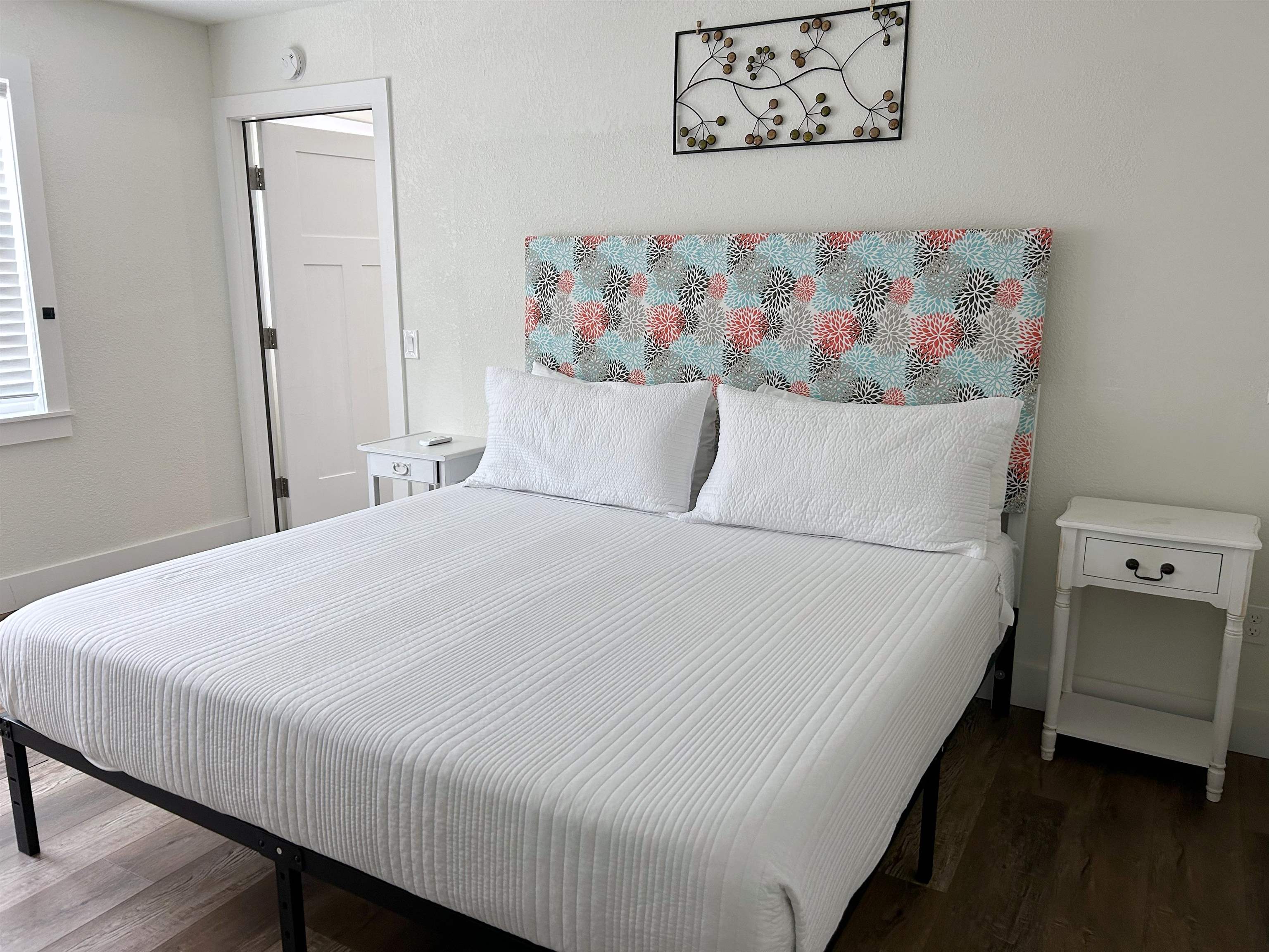 155 Drake Road St. Augustine, FL 32086 - Photo 18 of 32 a bedroom with a bed and a painting on the wall