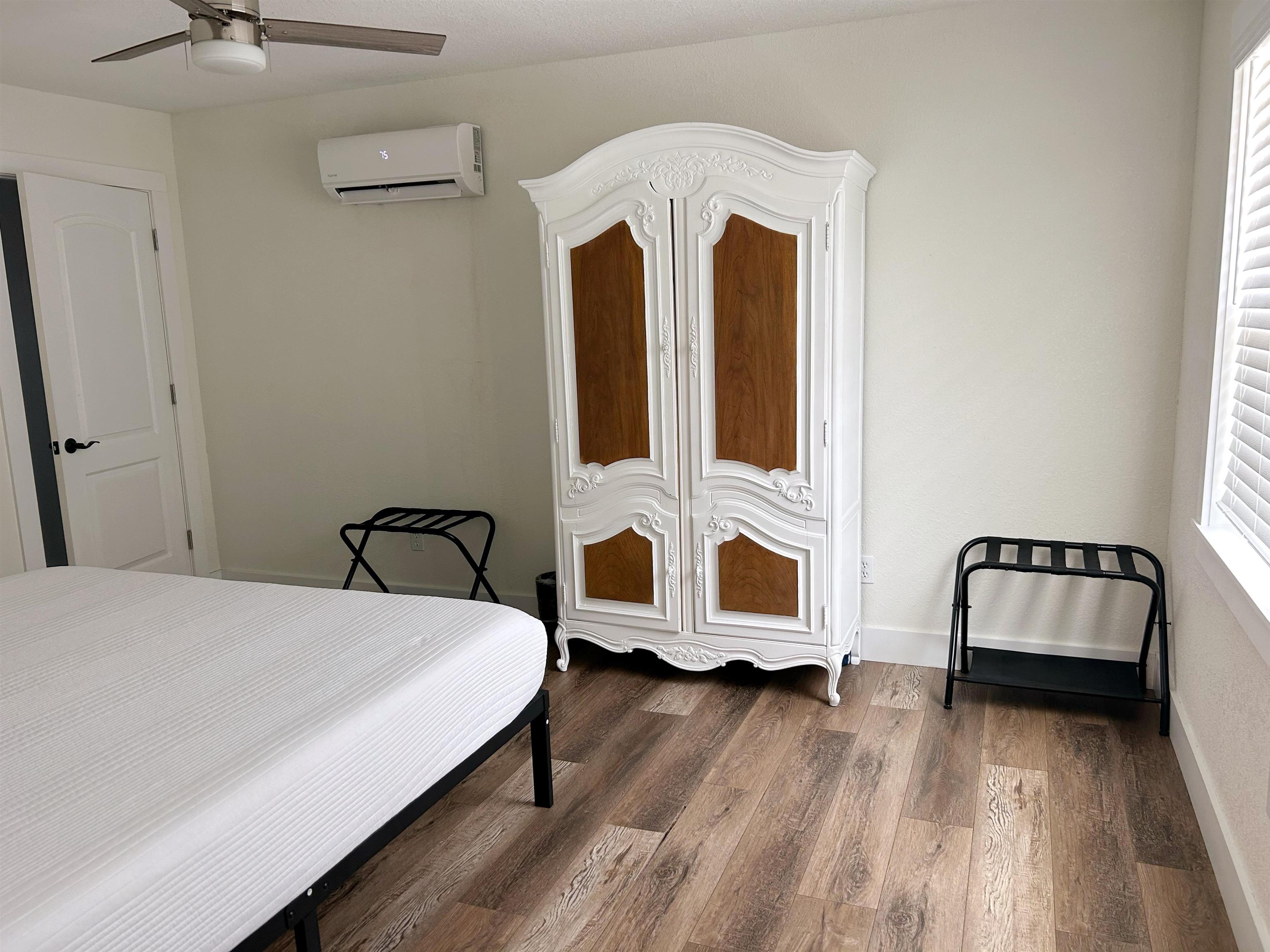 155 Drake Road St. Augustine, FL 32086 - Photo 19 of 32 a bedroom with a bed and a mirror