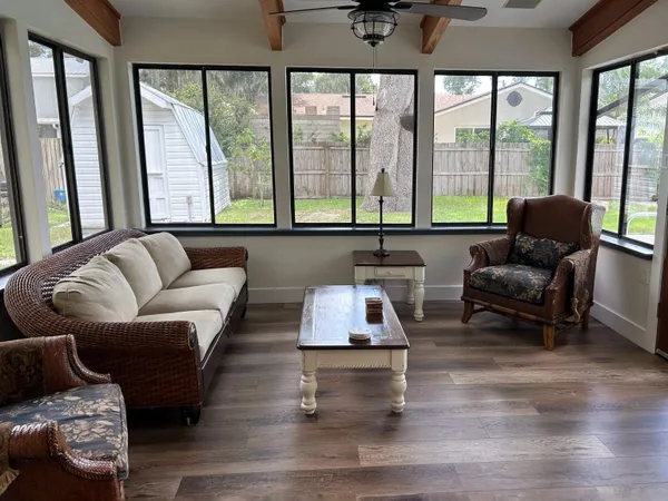 a view of a swimming pool with a patio