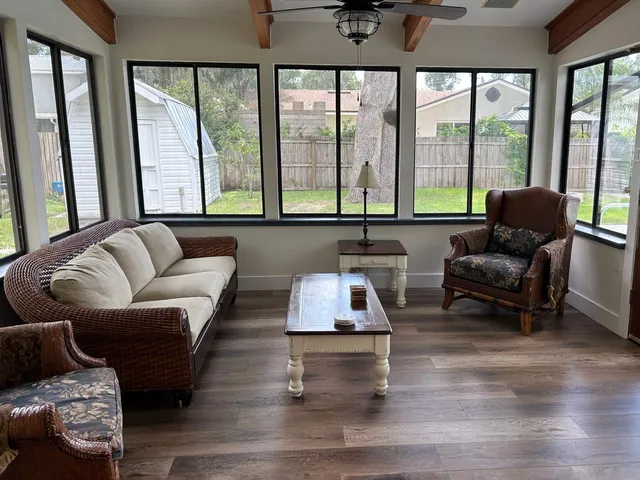 a view of a swimming pool with a patio
