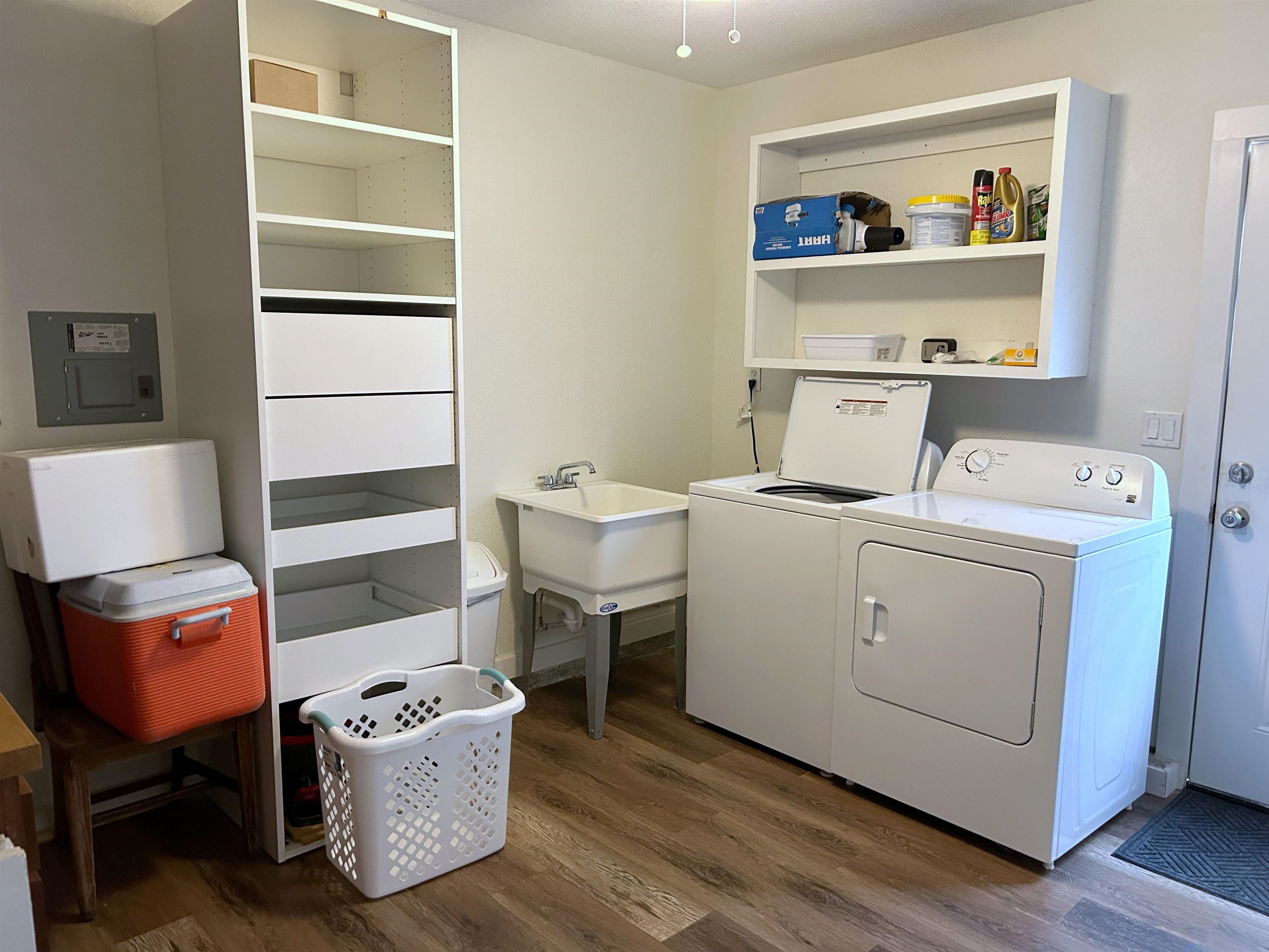 155 Drake Road St. Augustine, FL 32086 - Photo 21 of 32 a utility room with cabinets washer and dryer