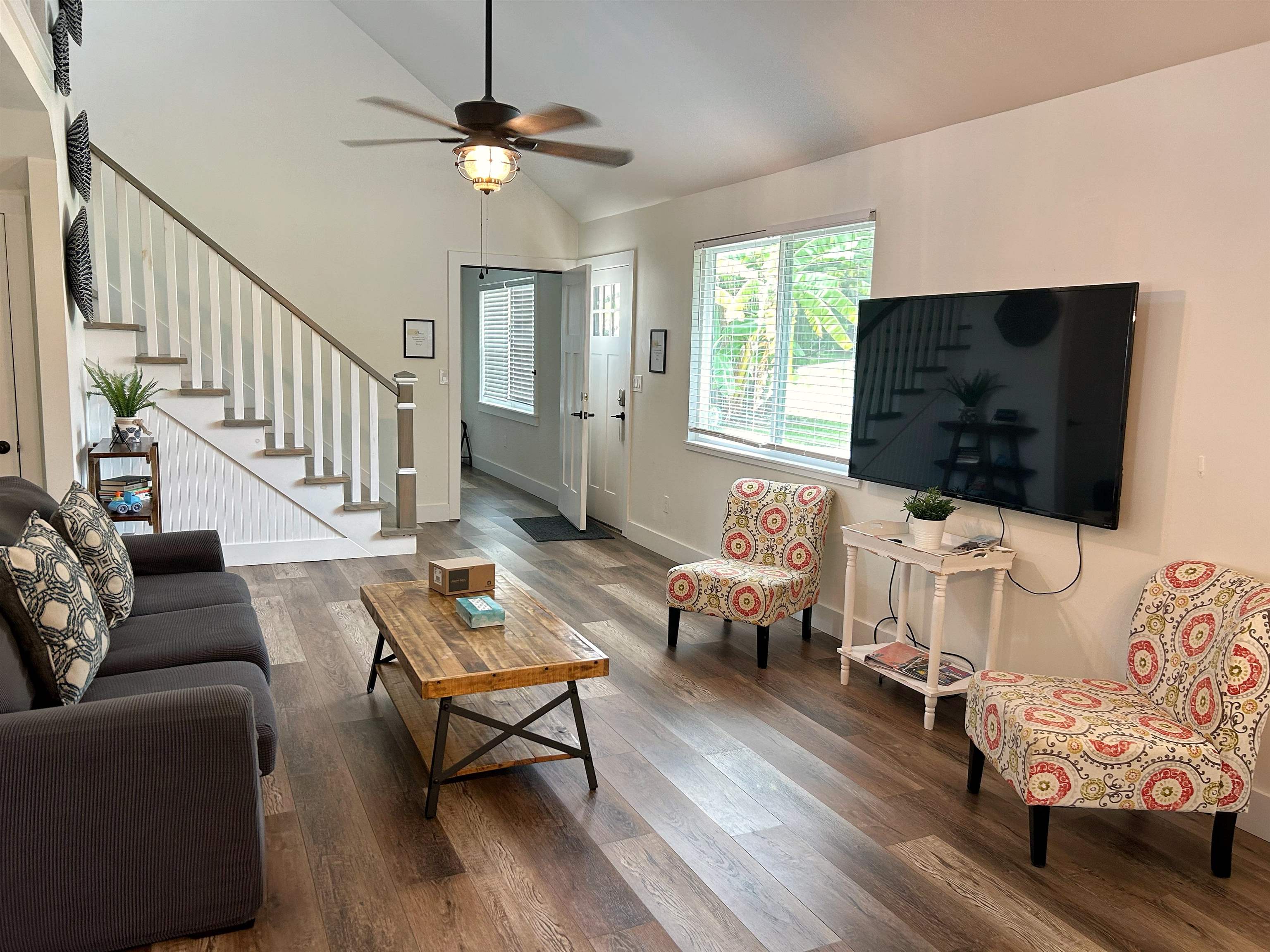 155 Drake Road St. Augustine, FL 32086 - Photo 6 of 32 a living room with furniture a flat screen tv and a window