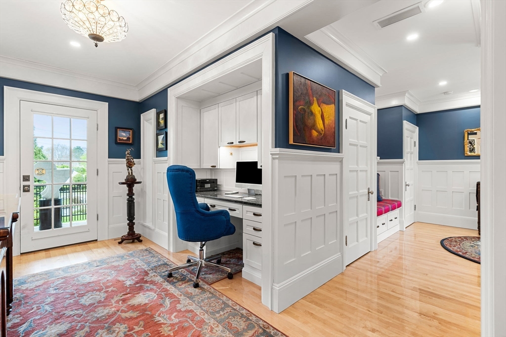 79 Wedge Street Lowell, MA 01851 - Photo 19 of 42 a workspace with furniture and window
