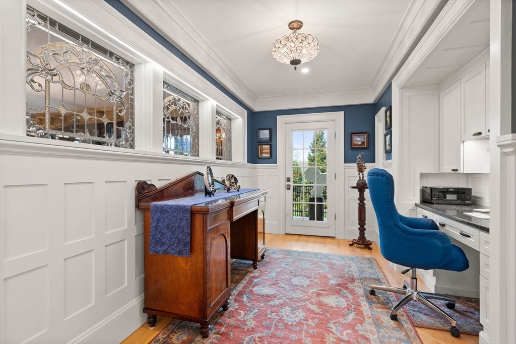 79 Wedge Street Lowell, MA 01851 - Photo 20 of 42 a living room with furniture a piano and a flat screen tv