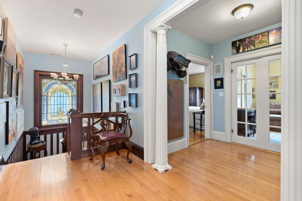 79 Wedge Street Lowell, MA 01851 - Photo 24 of 42 a view of a livingroom with furniture and windows
