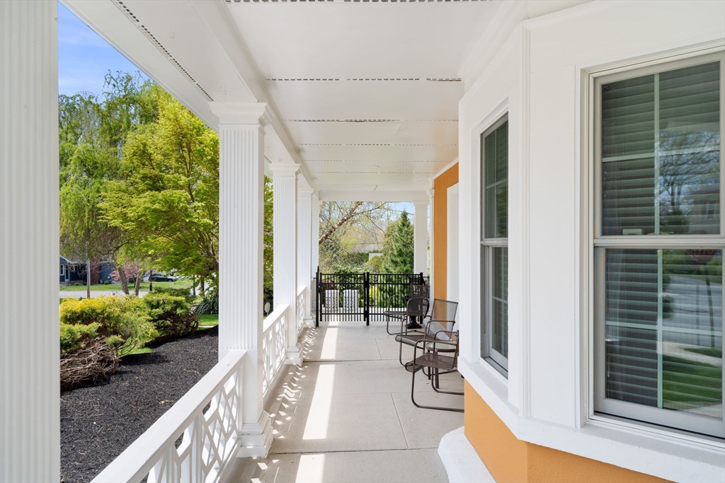 79 Wedge Street Lowell, MA 01851 - Photo 4 of 42 a view of a porch with furniture and garden