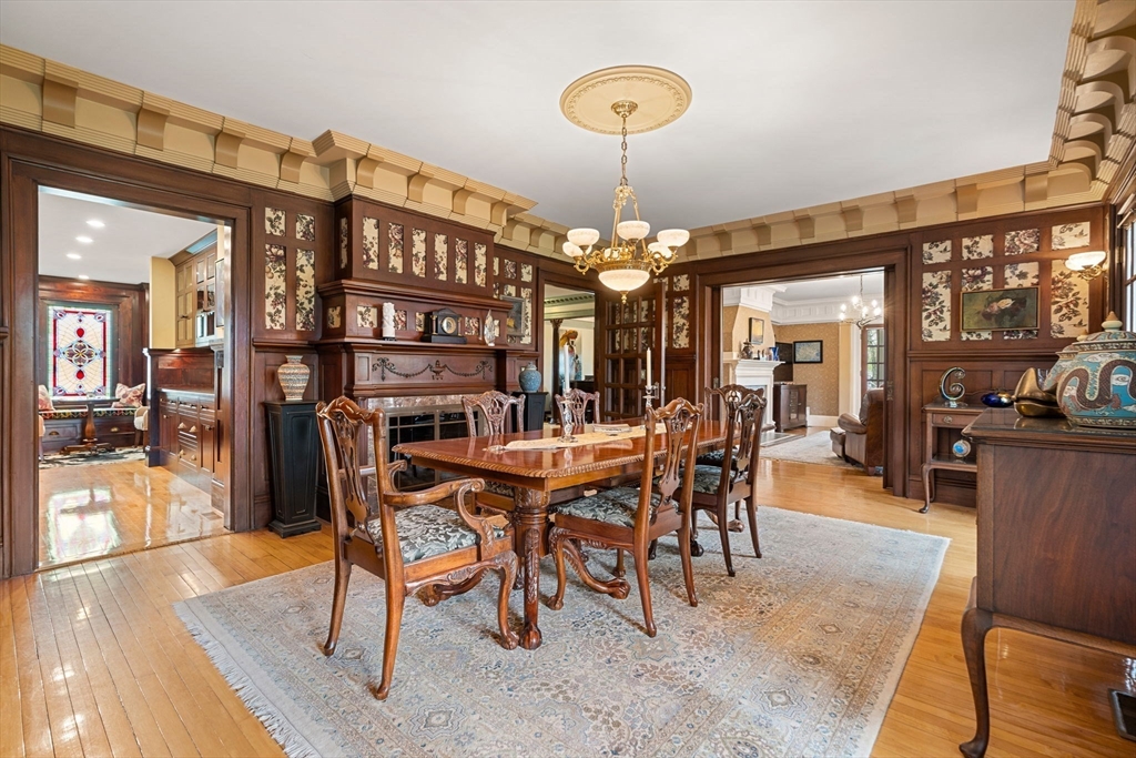 79 Wedge Street Lowell, MA 01851 - Photo 10 of 42 a view of a dining room with furniture window and wooden floor