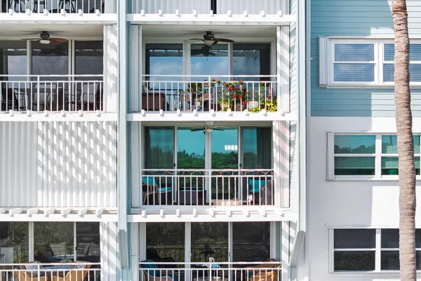 a front view of a building with a lot of windows
