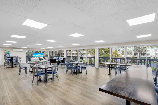 a kitchen with sink cabinets and window
