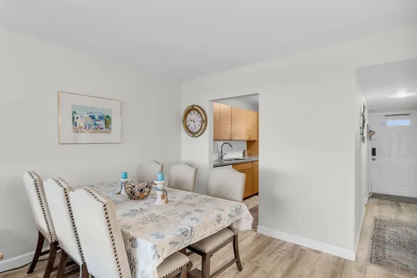 a view of a dining room that has a table and chair