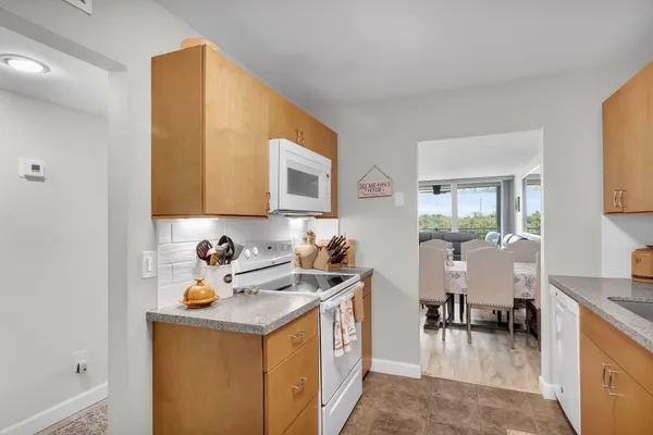 a utility room with two washing machine