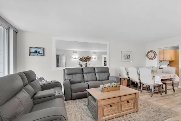 a living room with furniture and a couch