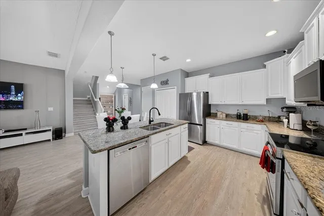 an aerial view of house with yard swimming pool and outdoor seating