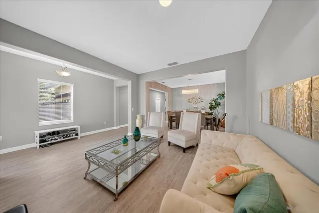 a living room with furniture and a couch