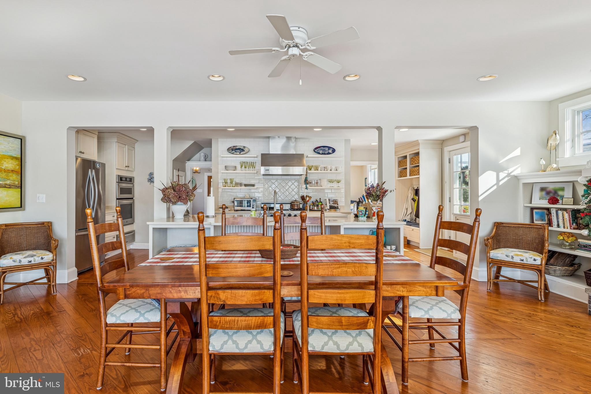 104 Myrtle Street Oxford, MD 21654 - Photo 5 of 13 a dining room with furniture and wooden floor