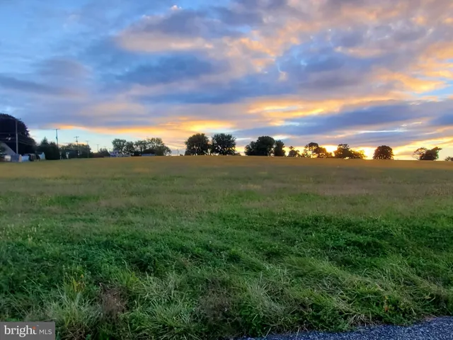 a view of a city with mountains in the background