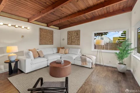 an aerial view of a house with a garden view