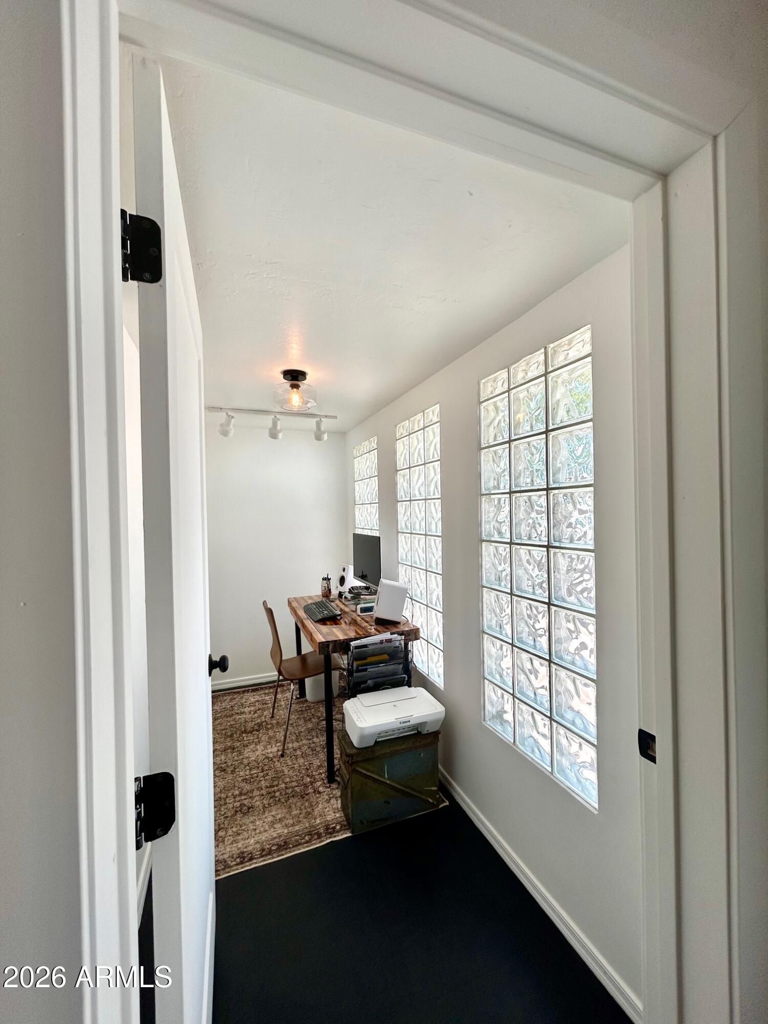 702 Paxton Avenue Miami, AZ 85539 - Photo 15 of 15 a dining room with furniture and a window