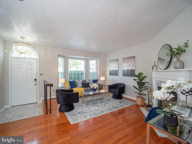 a living room with furniture or couch and a window