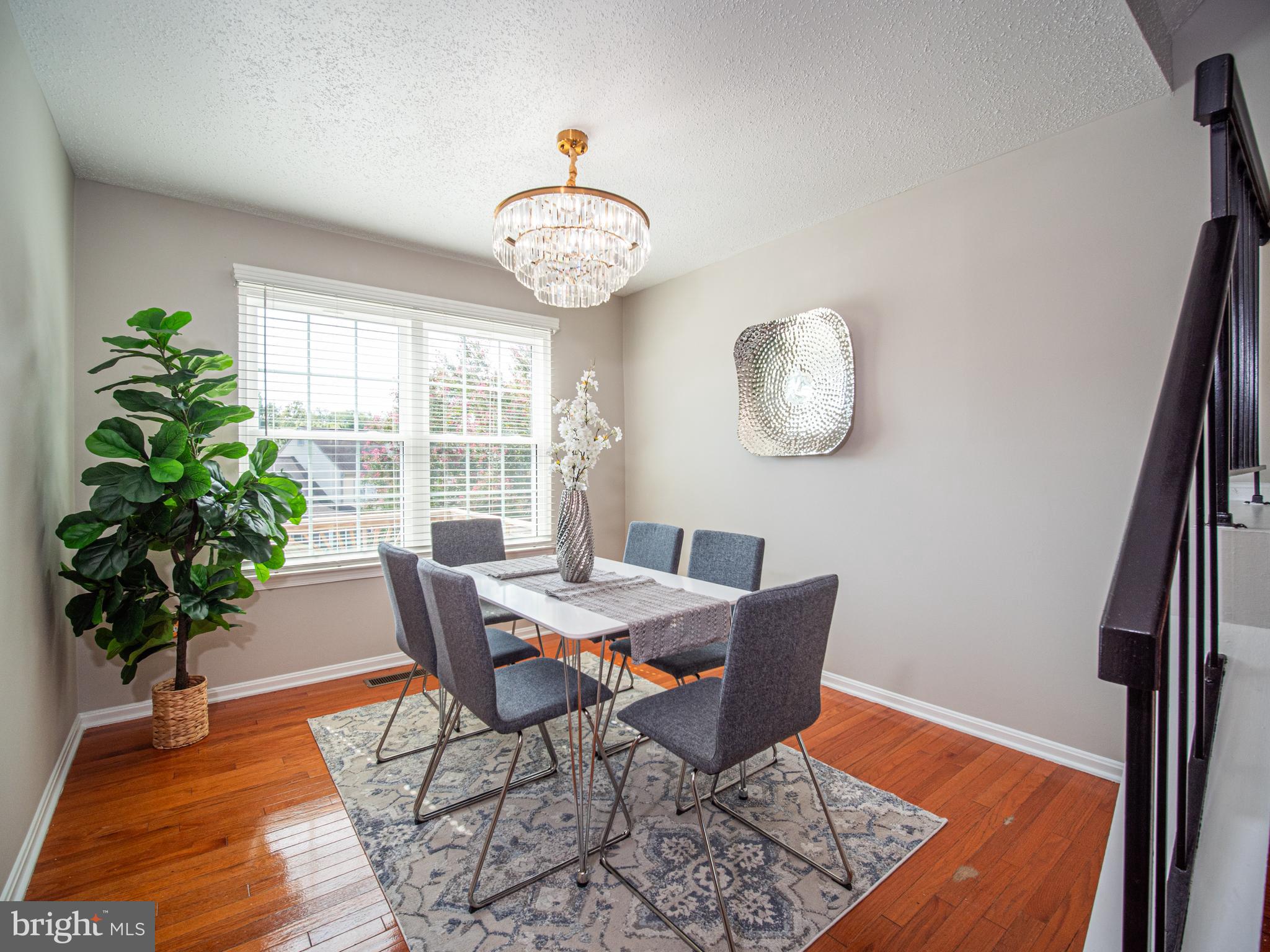918 Lake Overlook Drive Bowie, MD 20721 - Photo 5 of 29 a view of a dining room with furniture window and wooden floor
