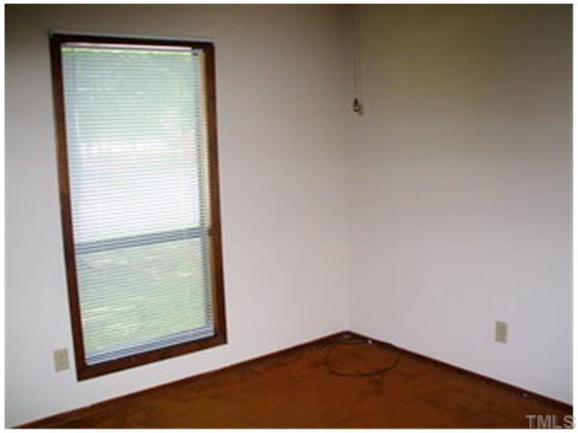 5201 Round Hill Lane Raleigh, NC 27616 - Photo 12 of 14 a view of an empty room with window