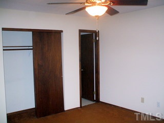 5201 Round Hill Lane Raleigh, NC 27616 - Photo 9 of 14 a view of hallway with chandelier