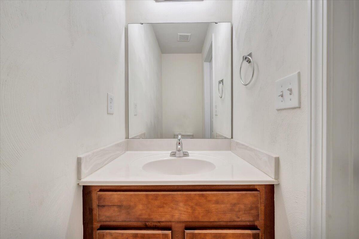 416 Old Fort Road Rocky Mount, VA 24151 - Photo 13 of 28 a sink with a mirror