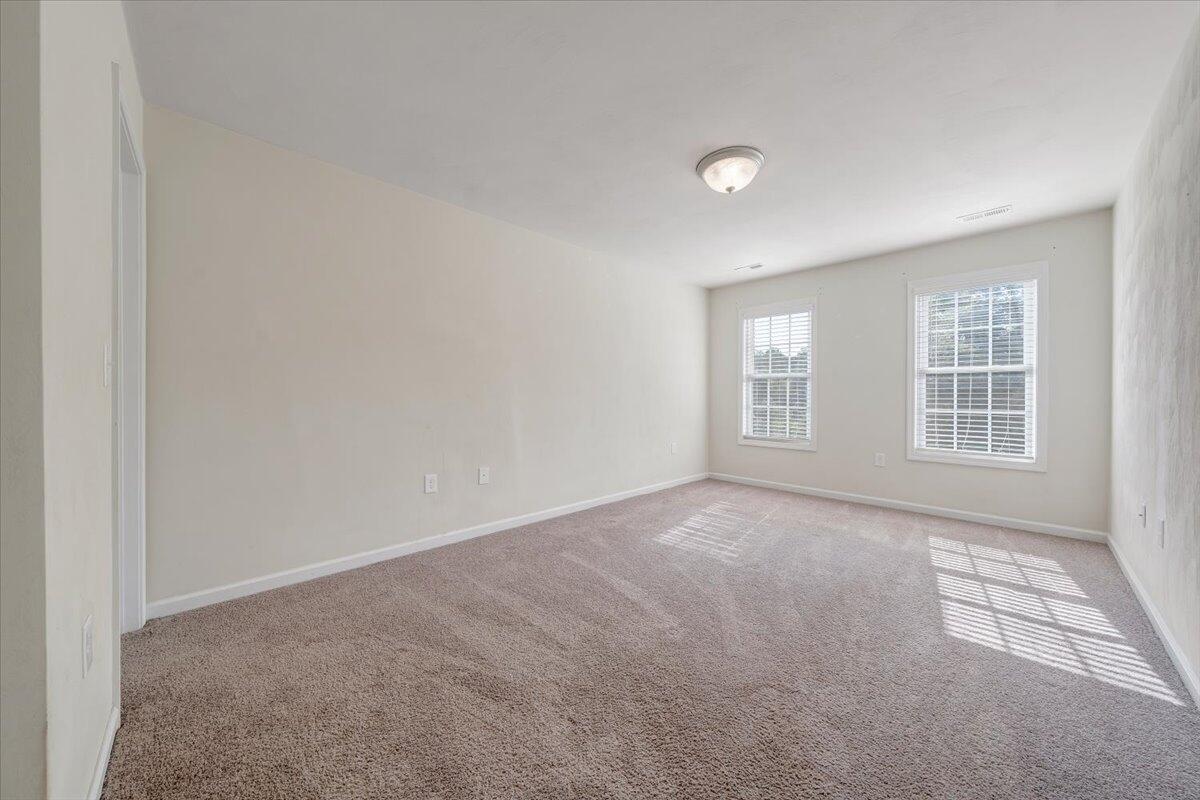 416 Old Fort Road Rocky Mount, VA 24151 - Photo 18 of 28 an empty room with windows